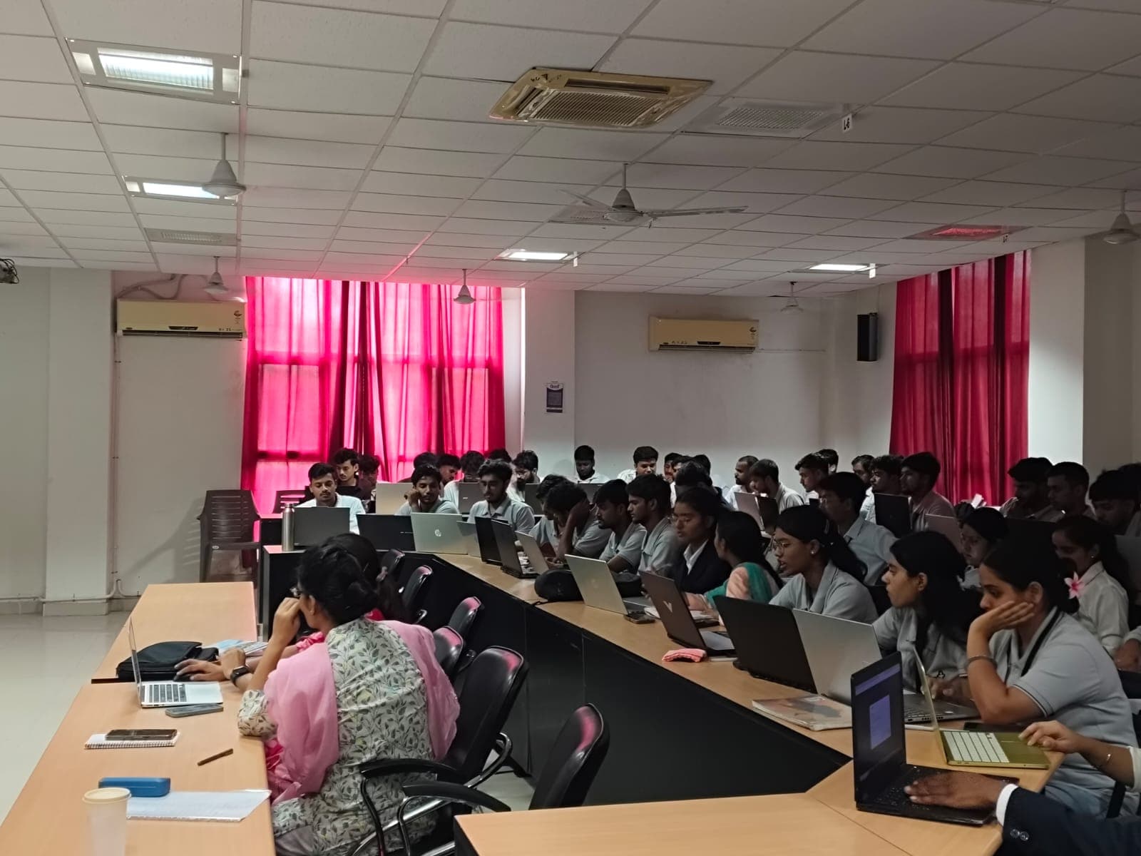 Students building agents at the lab benches